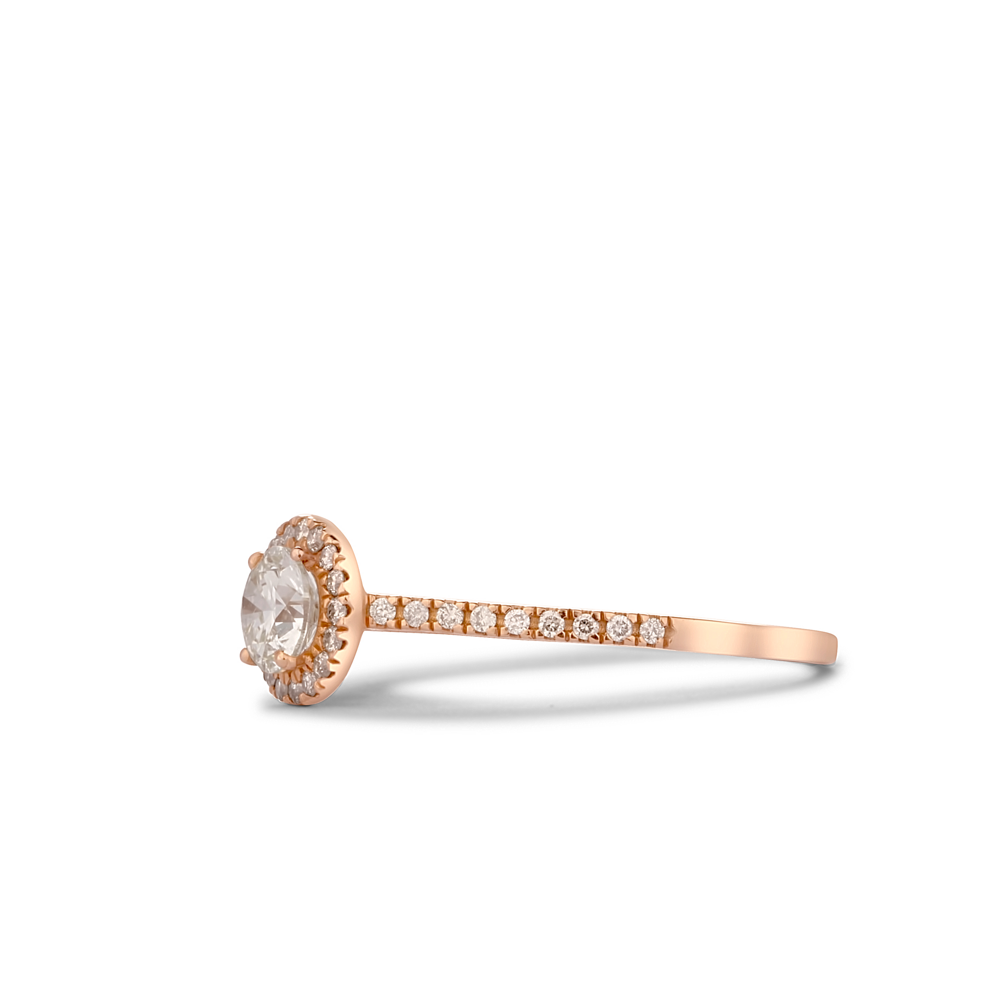 Rose gold ring with a diamond on a white background
