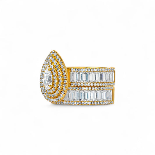 Gold and diamond ring on a white background