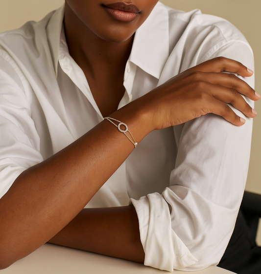Woman wearing a white shirt with a neutral background