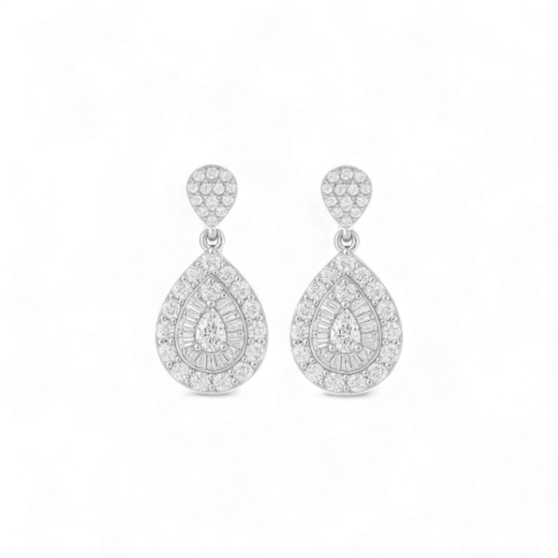 Pair of silver teardrop earrings with clear gemstones on a white background