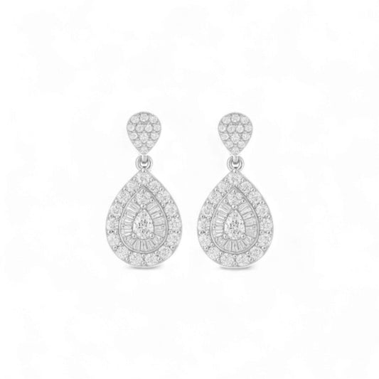 Pair of silver teardrop earrings with clear gemstones on a white background