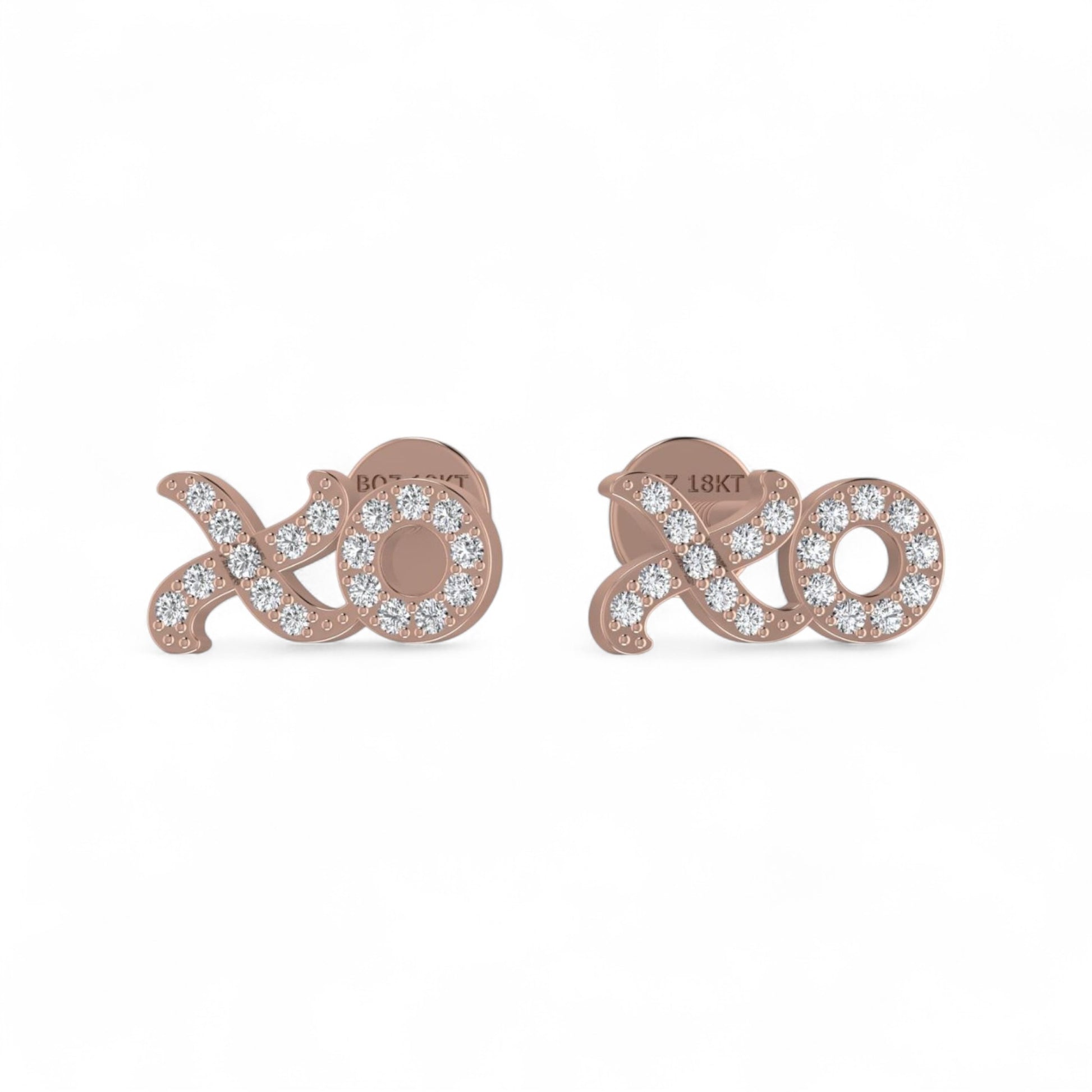 Rose gold earrings with 'xoxo' design on a white background