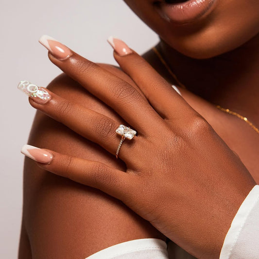 Nina Moissanite and Diamond Side Stones Engagement Ring in 18K Gold