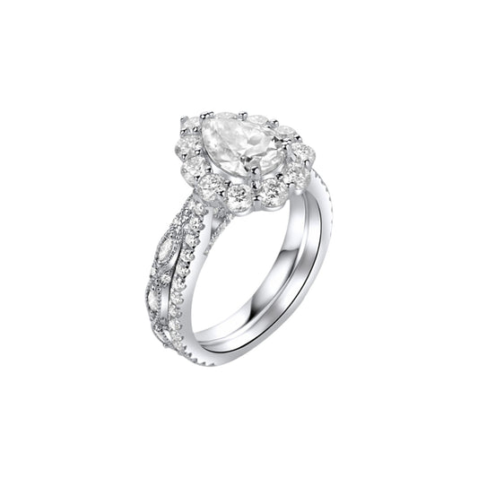 Silver ring with a large central gemstone on a white background